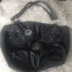 Beverly Hills PC bag. Used slightly. Great bag & straps stay on shoulder.